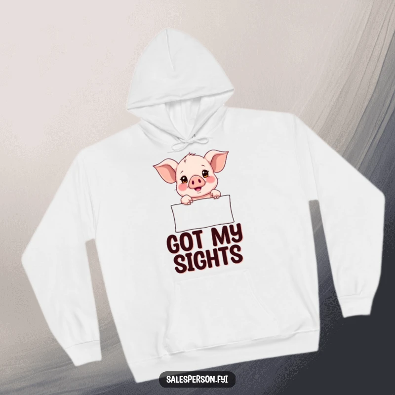 Funny Hoodie featuring a curious piglet pointing towards a banner, offering warmth and a symbol of hope and future possibilities.