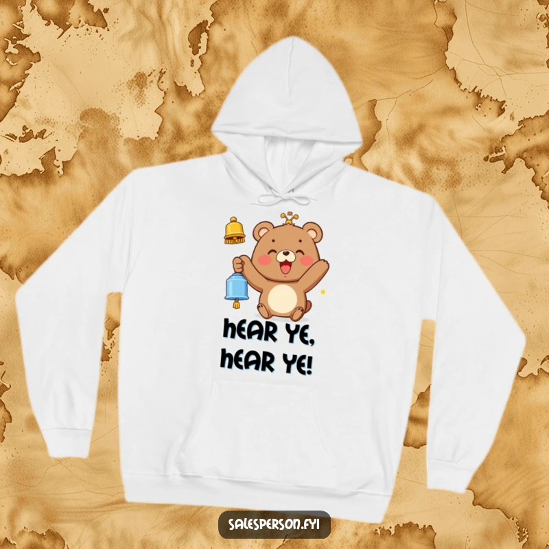Funny hoodie featuring a smiling bear ringing a bell with enthusiasm, perfect for spreading warmth and joy.