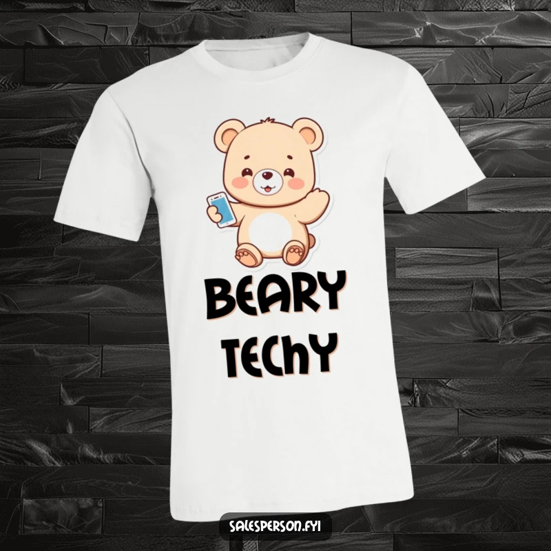 Funny t-shirt with a small bear happily presenting a brand new, shiny gadget with a grin.