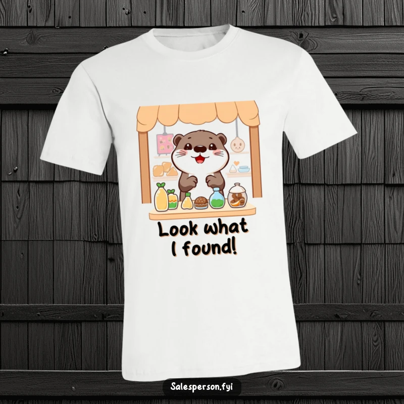 Funny Otter T-Shirt: A cheerful otter gestures widely towards enticing items, perfect for passionate shoppers.